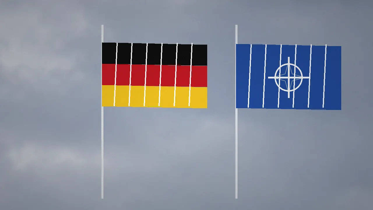 Флаги Германии и НАТО на фоне пасмурного неба